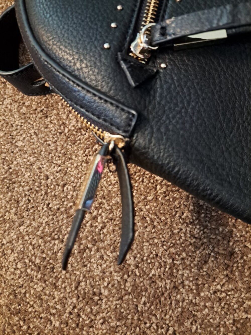 Black Steve Madden embroidered floral backpack with gold hardware. - Picture 11 of 13